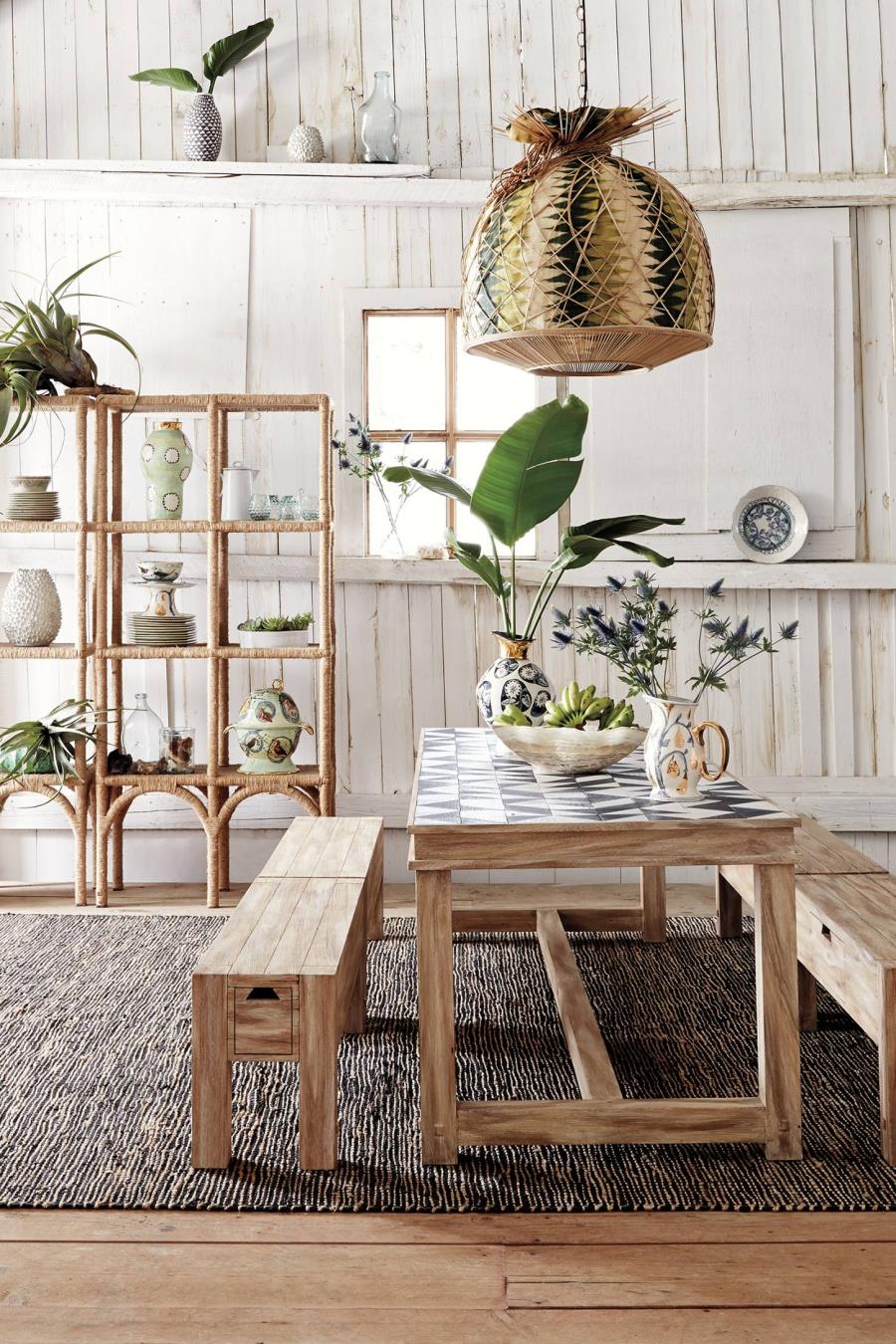 Large pendant light in a tropical dining room