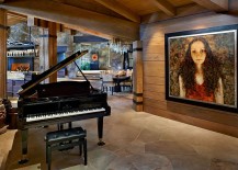 Large-portrait-and-grand-piano-bring-elements-of-classic-design-to-the-woodsy-mansion-217x155