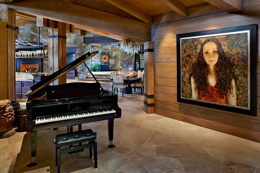 Large portrait and grand piano bring elements of classic design to the woodsy mansion