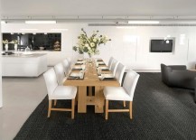 Large-textured-black-rug-in-a-dining-and-living-area-217x155