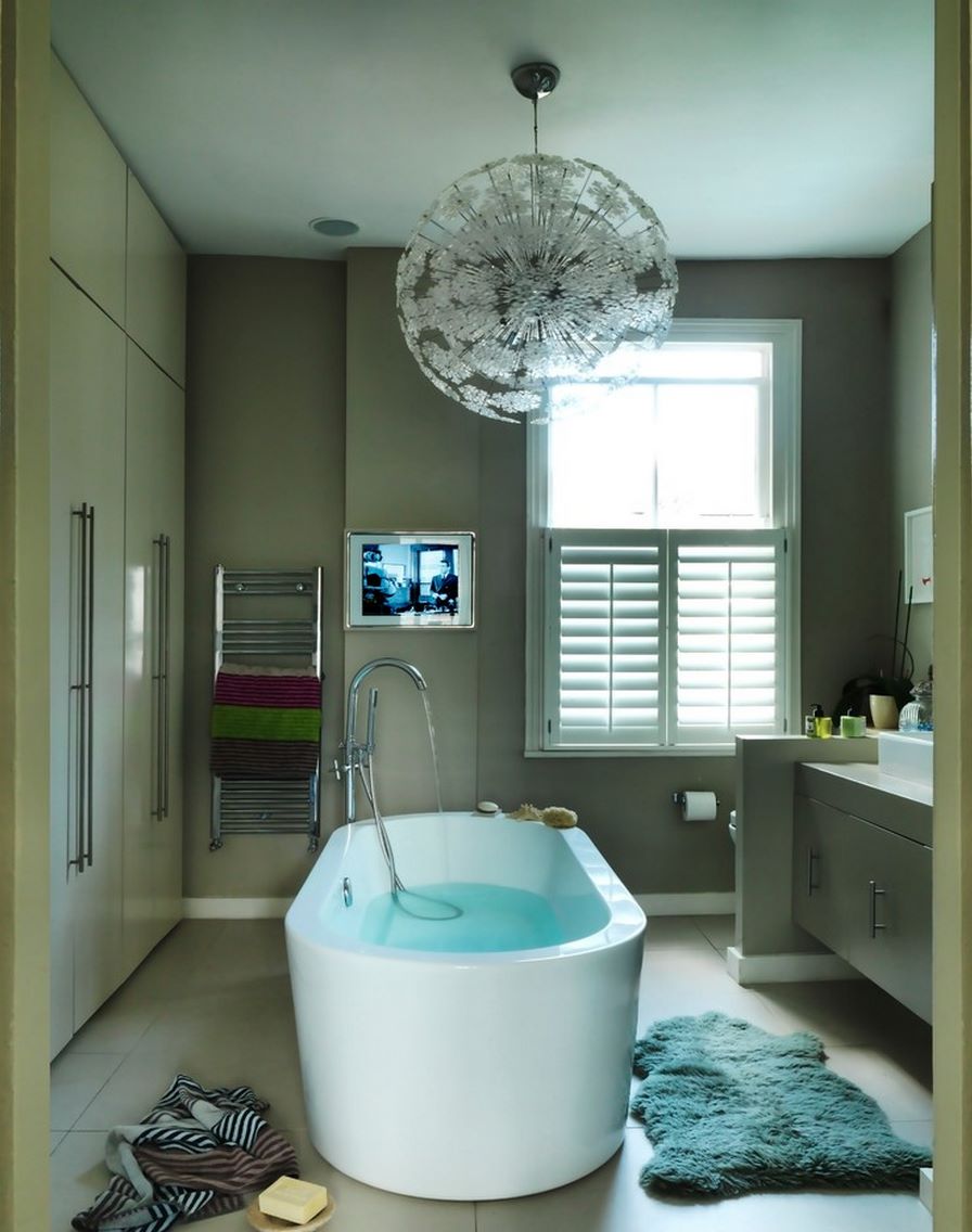 Large tile flooring in a comfy modern bathroom