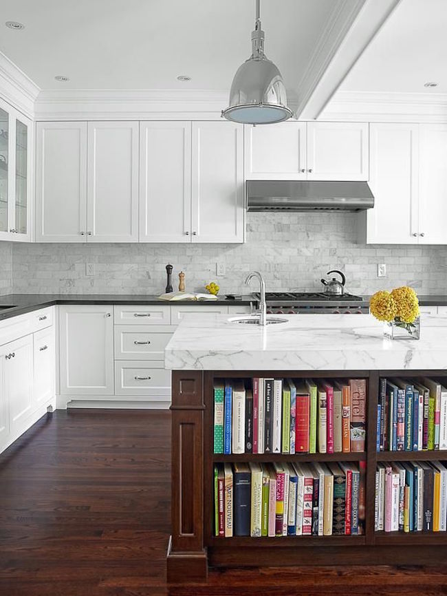 Library-style bookshelves built into kitchen island