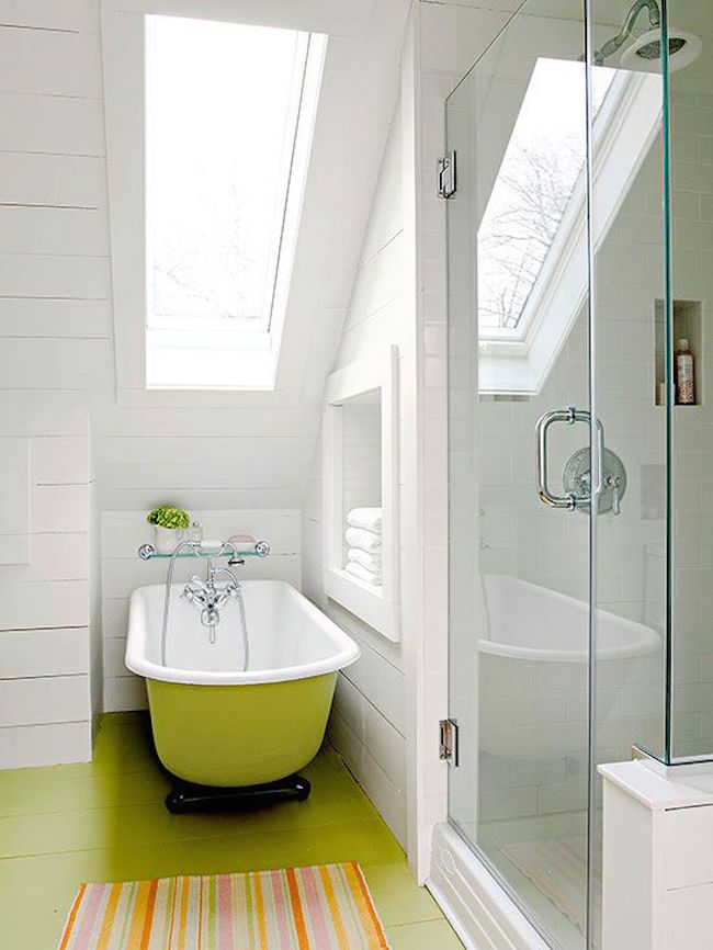 Lime green tub and floor in a bright white attic