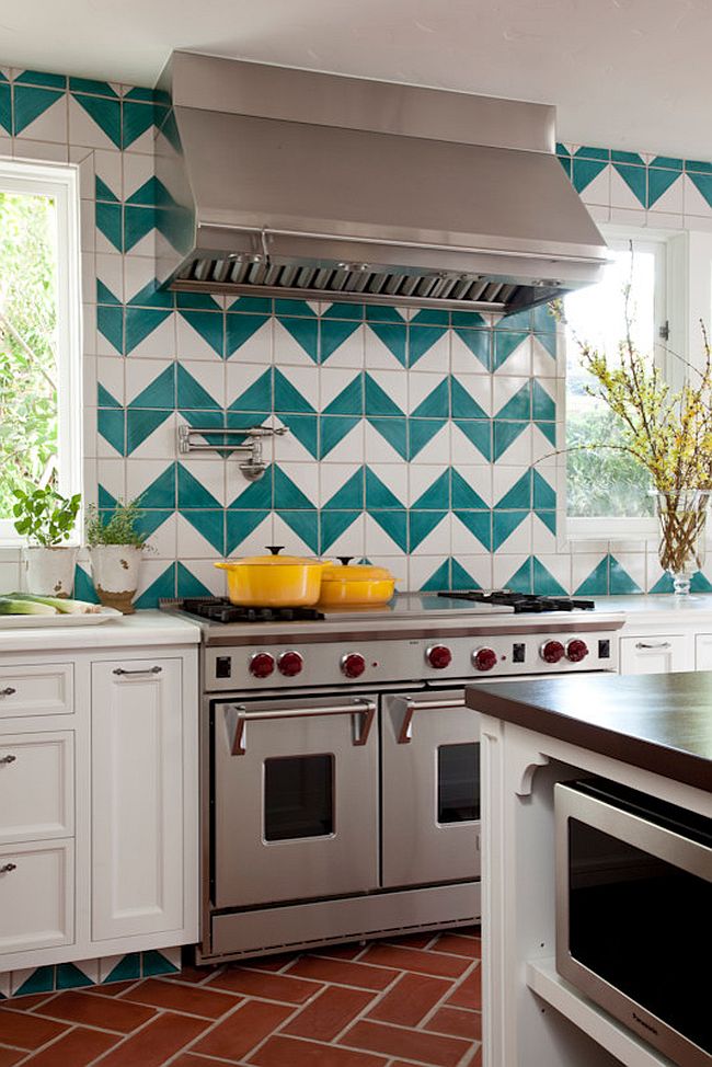 Mediterranean kitchen with a chevron pattern backsplash [Design: Kristin Lomauro Interior Design]