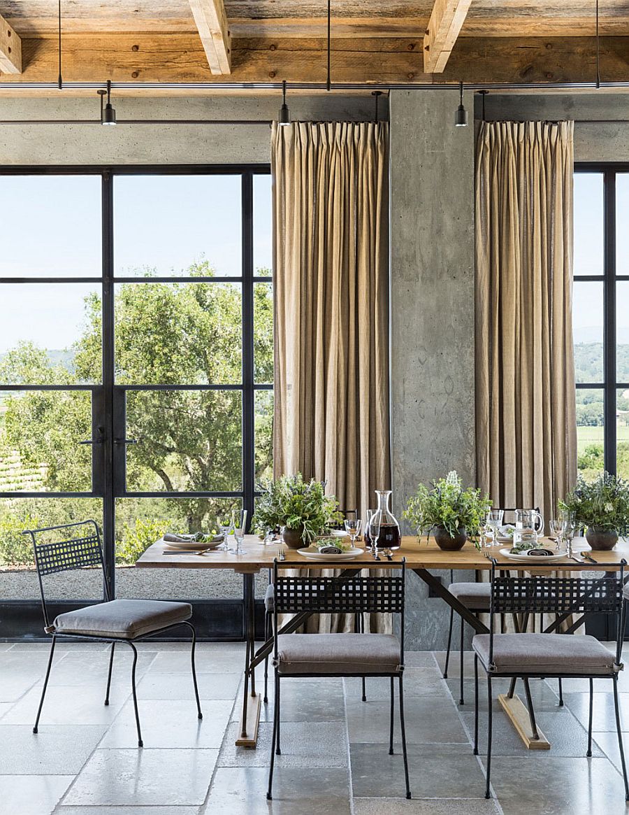 Metal factory windows bring industrial elemnt to the rustic home