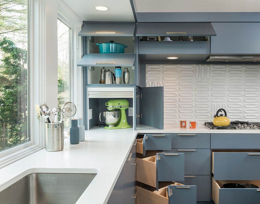 Midcentury modern kitchen with gorgeous gray cabinets [Design: Flavin Architects]