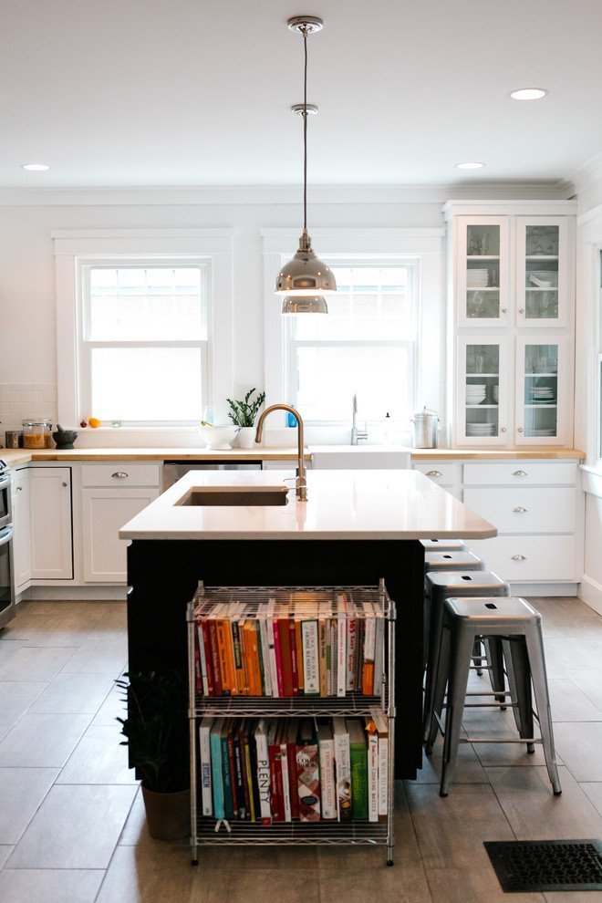 Mini metal storage rack beside kitchen island