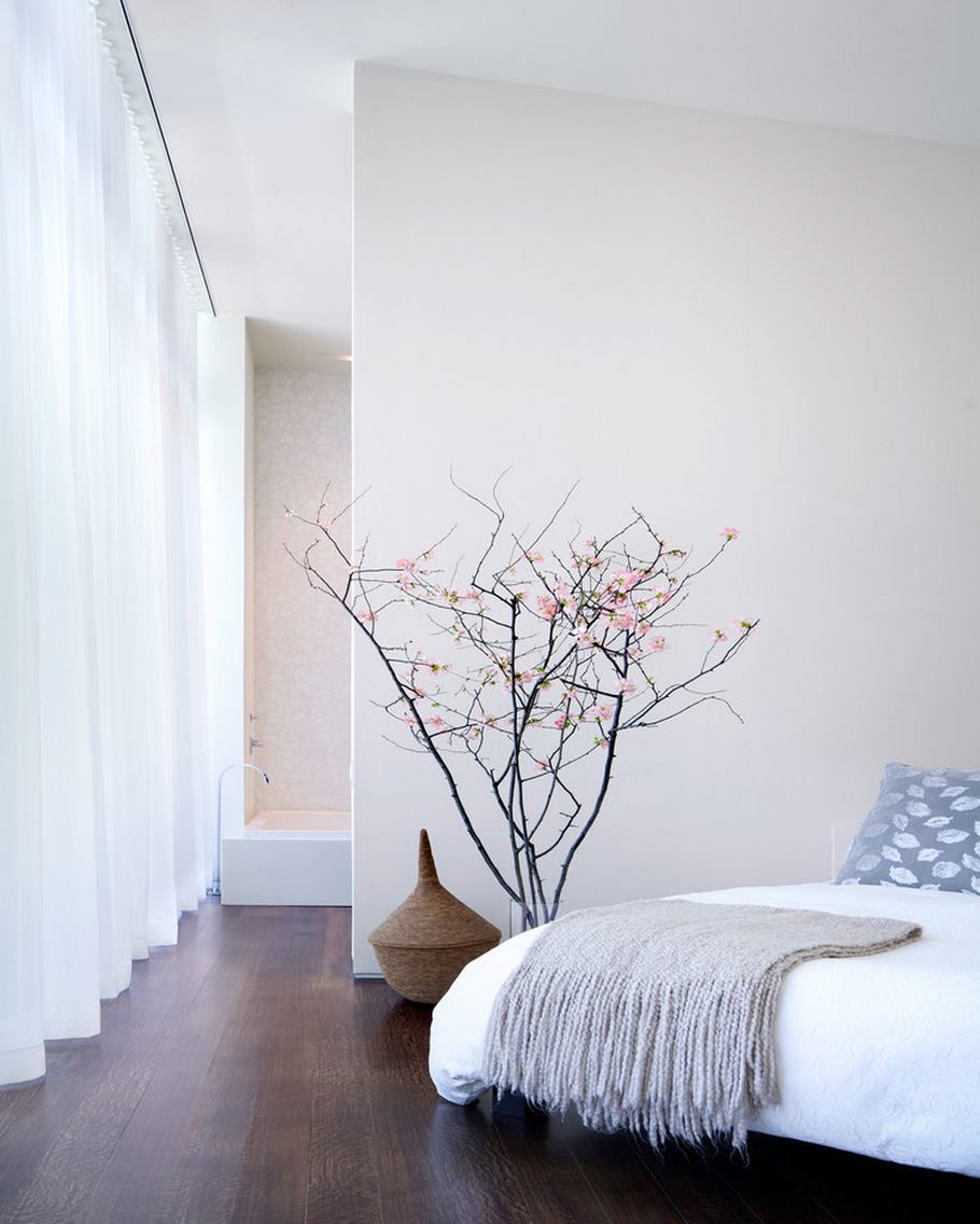 Modern vase of bedside cherry blossoms