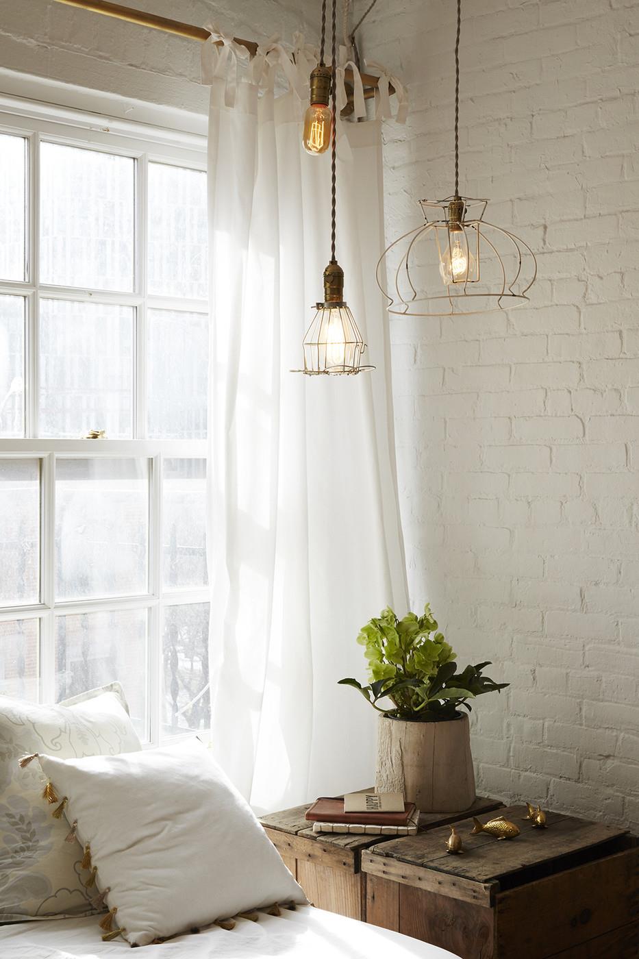 Painted brick wall in a rustic bedroom