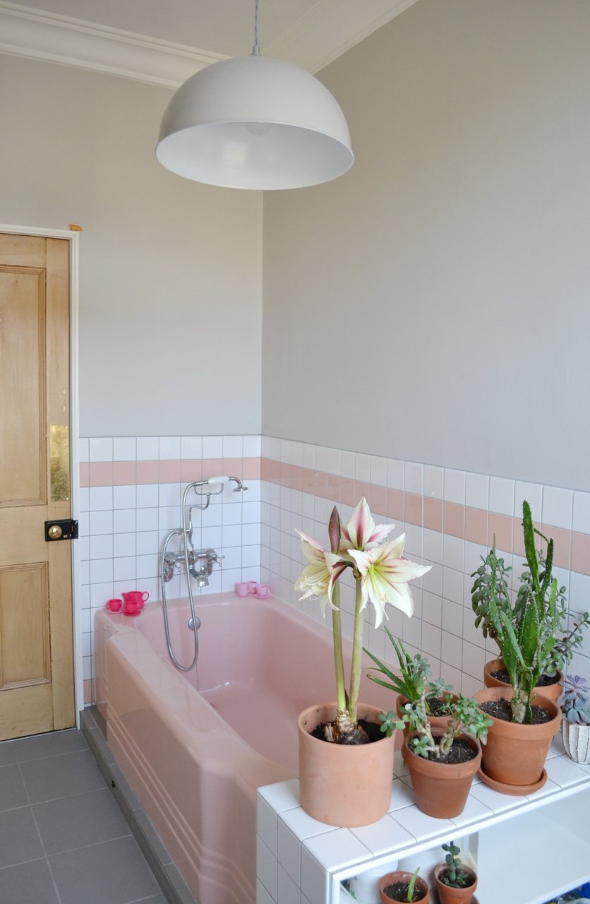 Pink tub in a retro bathroom