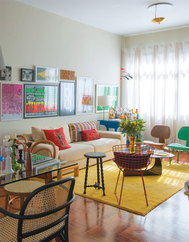 Plain, bright yellow area rug in colorful living room