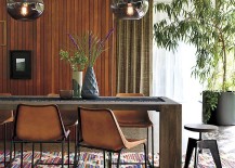 Potted-plants-and-vase-greenery-add-life-to-this-modern-dining-room-217x155