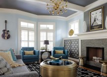 Round-metallic-coffee-table-side-tables-and-chandelier-bring-glitter-to-the-casual-living-room-217x155