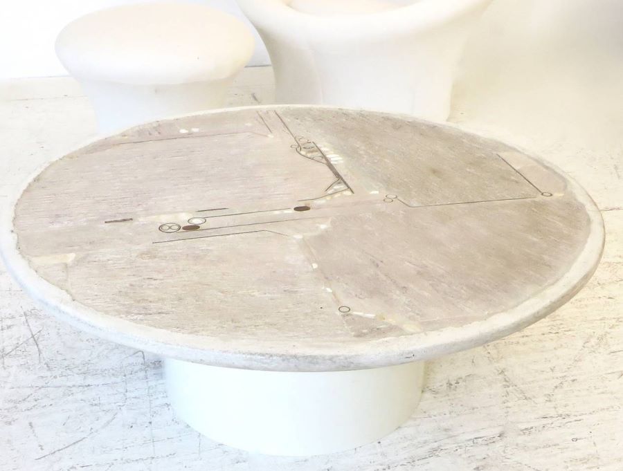 Round stone, metal and concrete coffee table