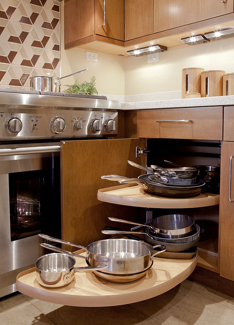 Small contemporary kitchen features corner cabinet with Lazy Susan [Design: KB Cabinets]