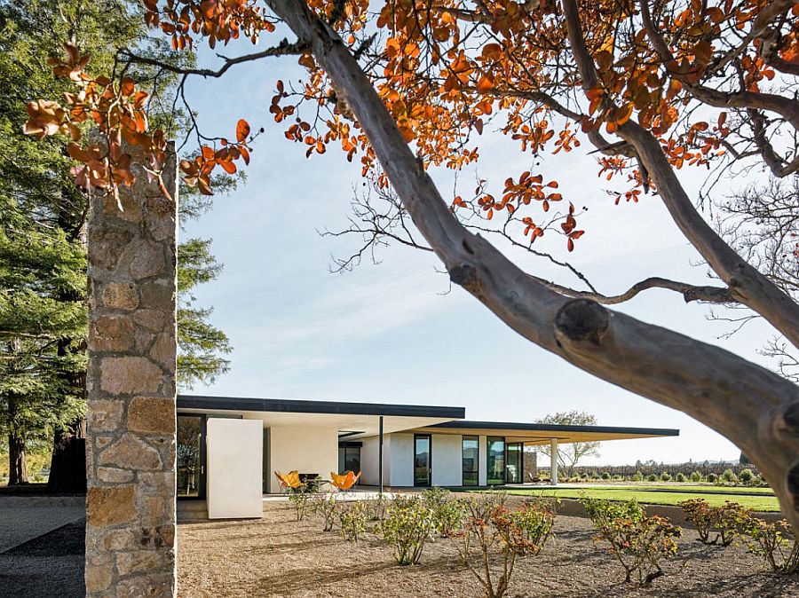 Stone and cedar walls of the Oak Knoll Residence