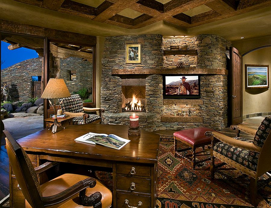 Stone wall with fireplace in the home office [Design: Bess Jones Interiors]