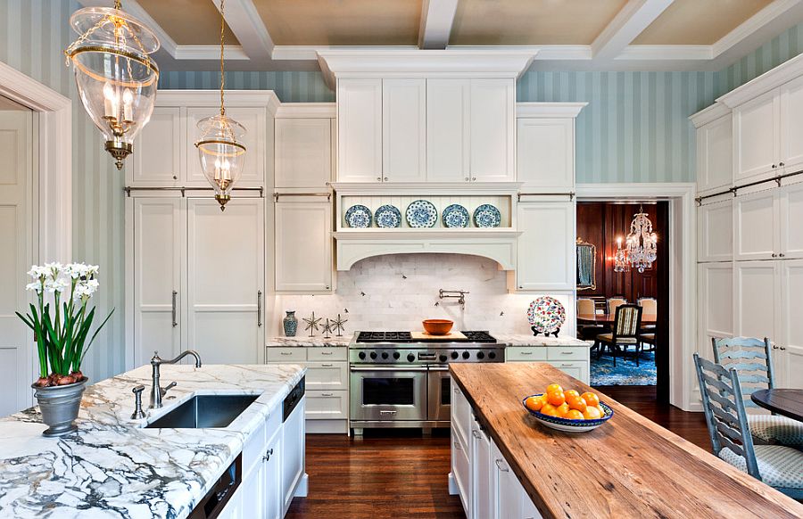 Striped wallpaper creates a soothing backdrop for the spacious traditional kitchen