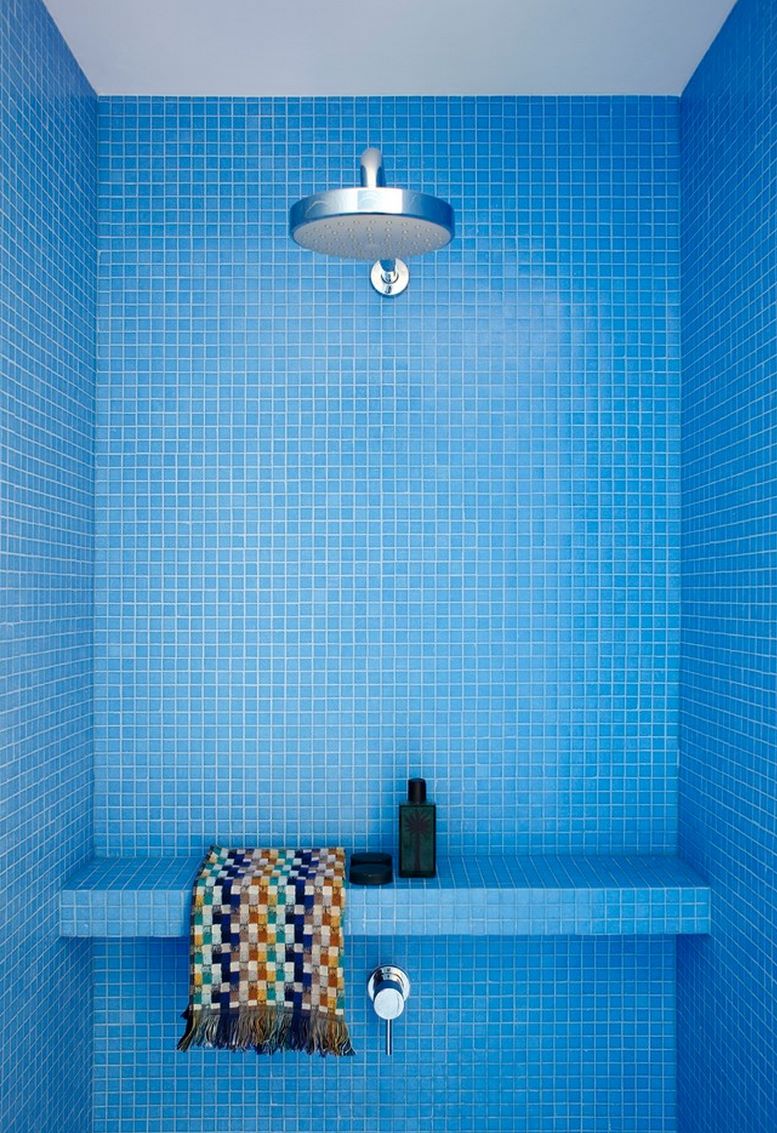 Stunning shower filled with blue tile