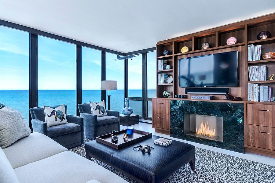 Stunning sunroom with Walnut Entertainment Center and ocean views