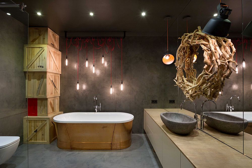 Stunning use of standalone tub and indsutrial style lighting in the bathroom