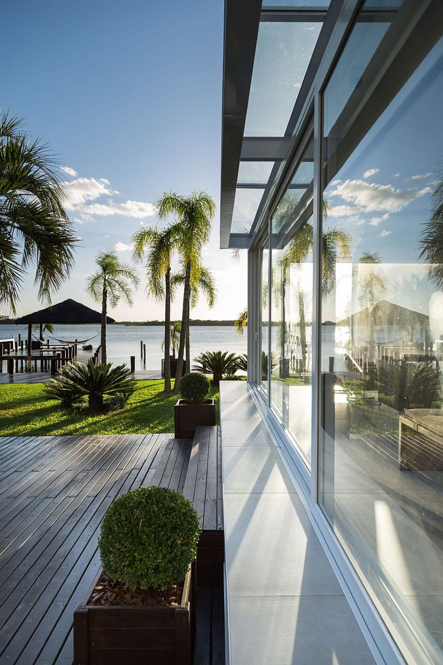 Stunning views of the lake and a relaxing deck grace the lovely pool home