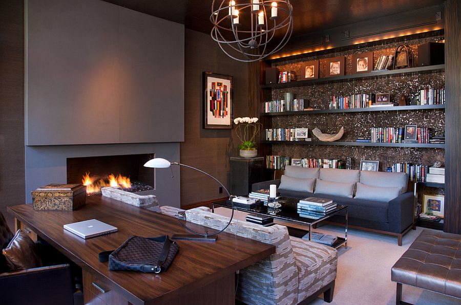 Stylish home office with plenty of shelf space and a chic fireplace [Design: Lori Gentile Interior Design]