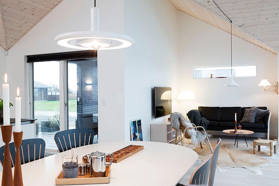 Stylish pendant and sconce lights enliven the relaxing holiday home