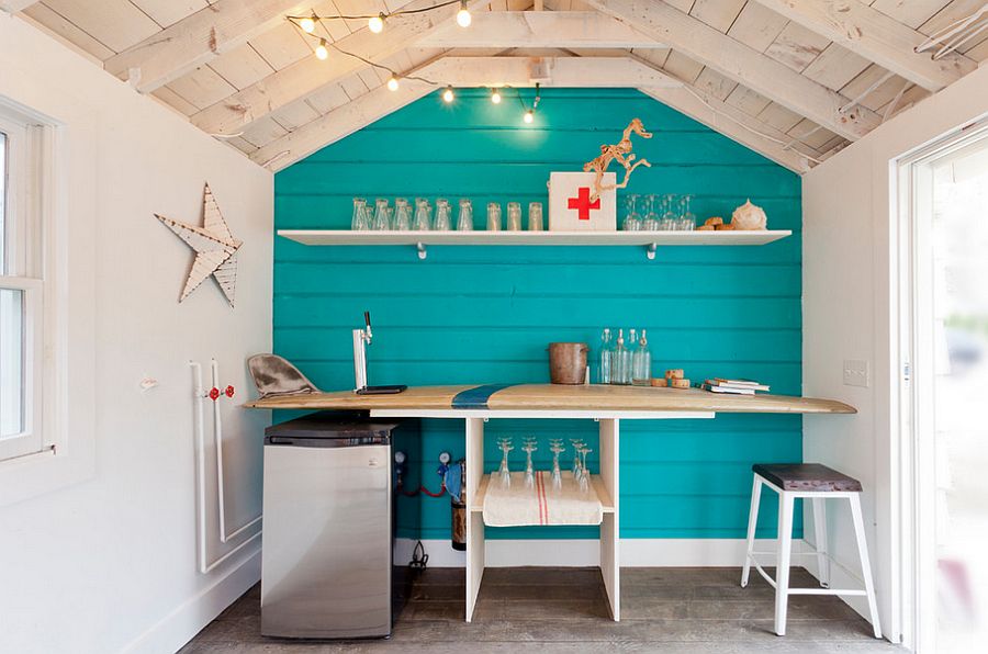 Surfboard bar in the small beach style shed captures the magic of lazy summer days