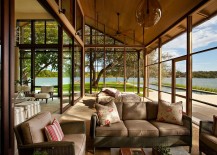 Suspended-bed-and-sliding-glass-doors-for-the-sunroom-with-lake-views-217x155
