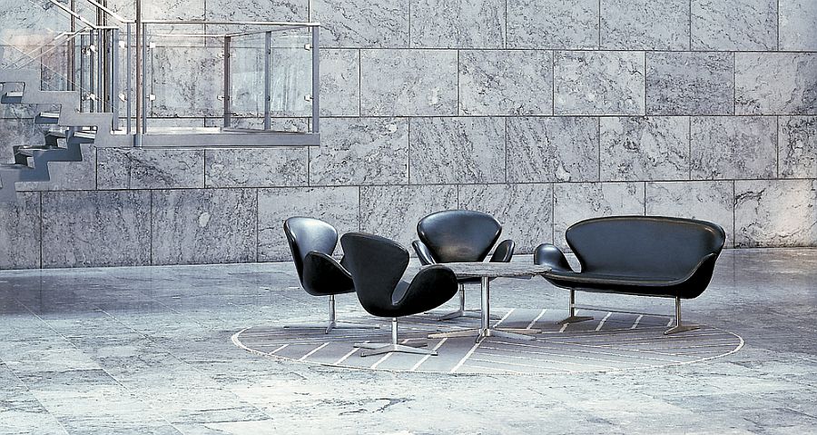 Swan, model 3320 and Swan Sofa, model 3321 in black Classic leather. Designed by Arne Jacobsen in 1958. The image is from the lobby of the Danish central bank.