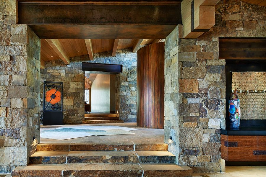 Sweeping entrance of the rustic retreat in stone and wood