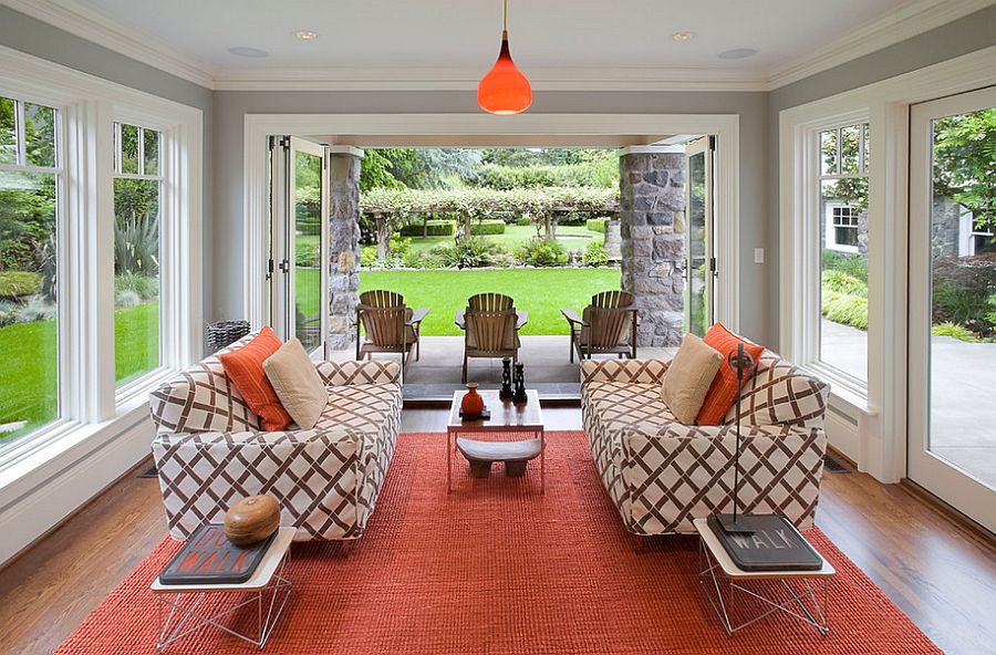 Twin Eames Wire Tables add to the style of the cool sunroom