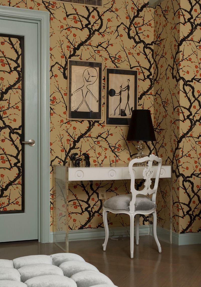 Unexpected touches in a bedroom with cherry blossom wallpaper