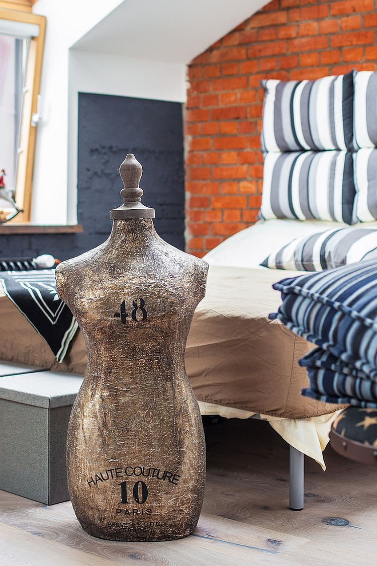 Unique accessories give an eclectic charm to the industrial bedroom