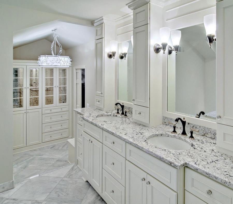 White ice granite in a bright and airy powder room