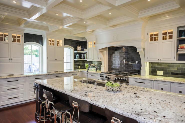 White ice granite in a high-contrast kitchen