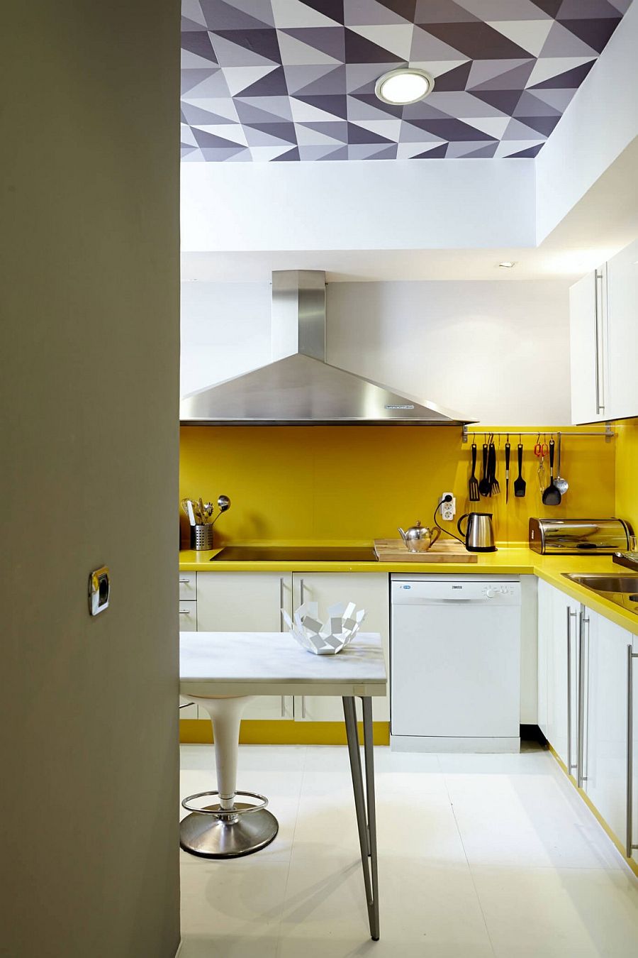 White kitchen with a vivacious yellow backsplash