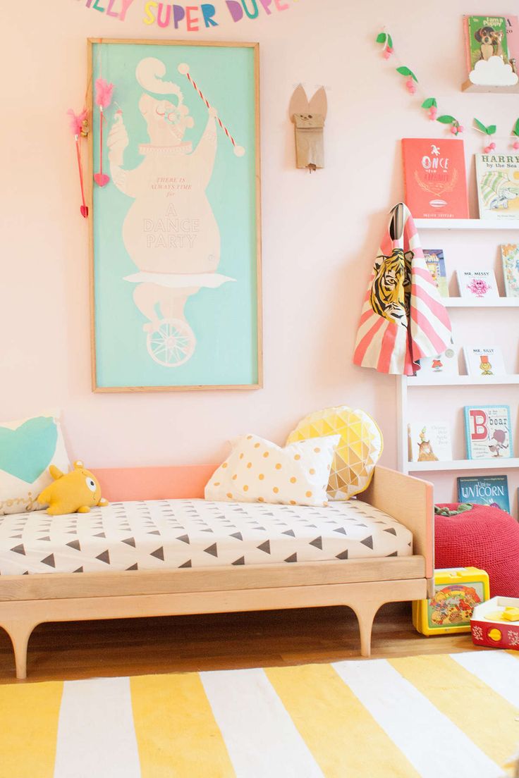 Yellow and white striped rug for children's room