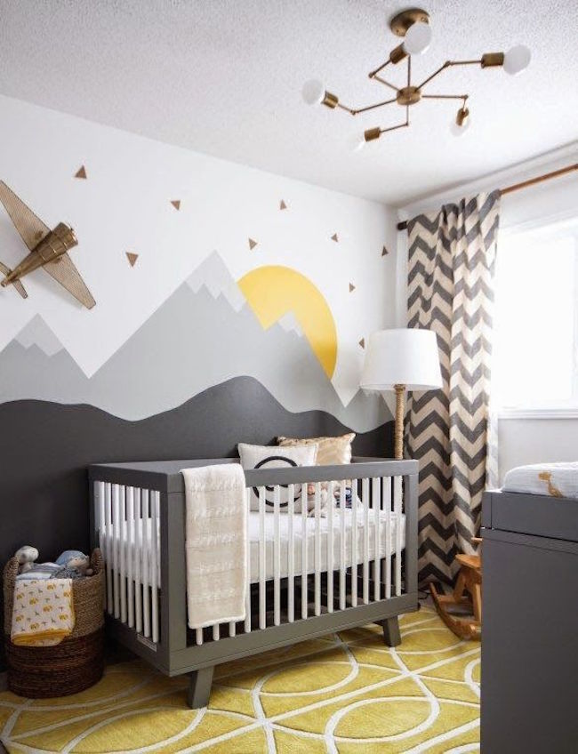 Yellow swirl rug used in nursery