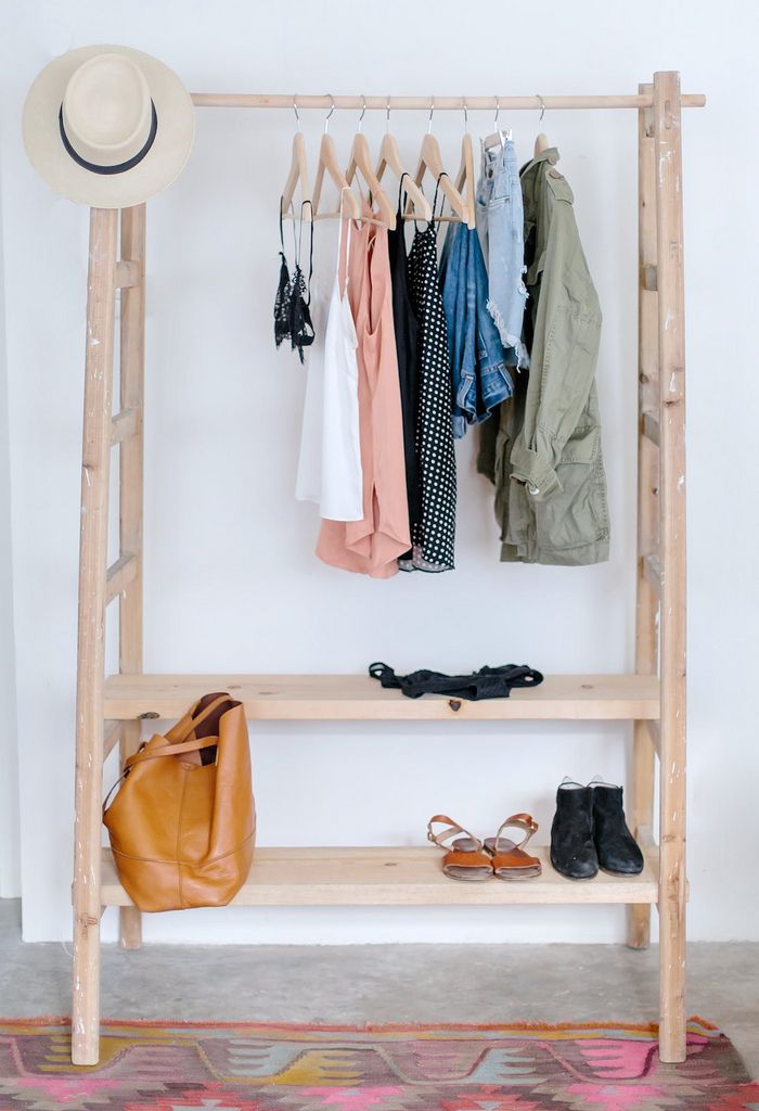 Two ladders make a unique closet storage solution