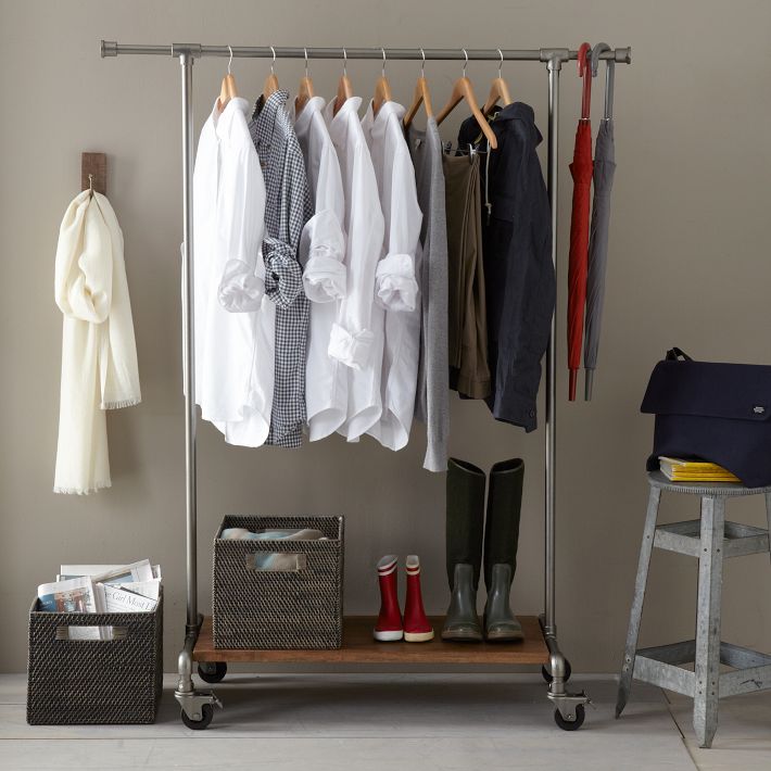 Old fashioned clothing rack used to display apparel and accessores