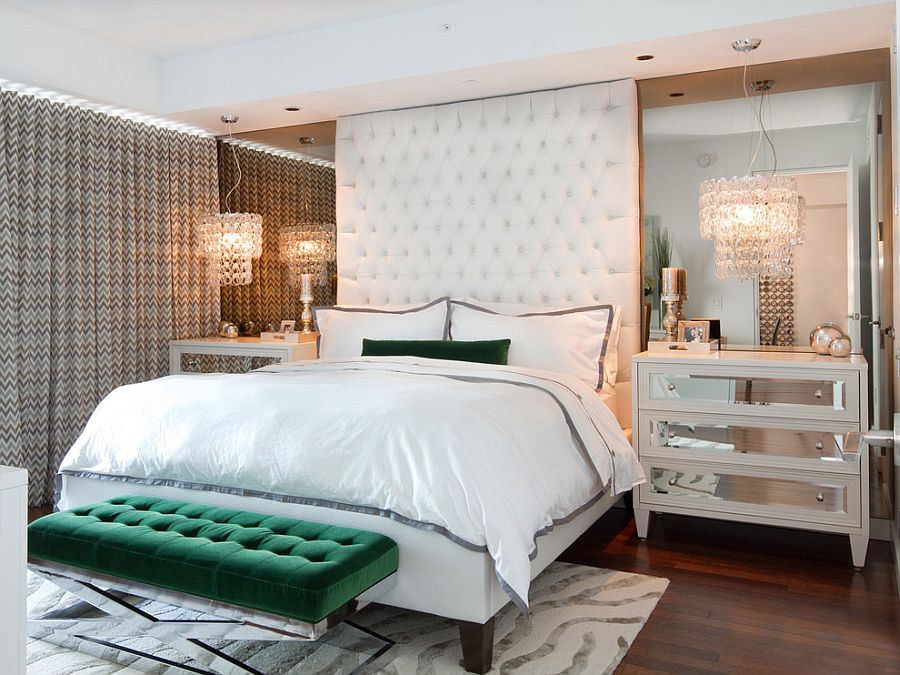 Bedroom bench in emerald steals the show in this luxurious space