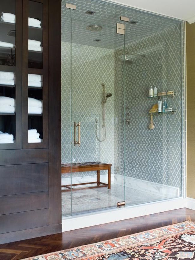 Bench placed in large walk-in shower as alternative to built-in