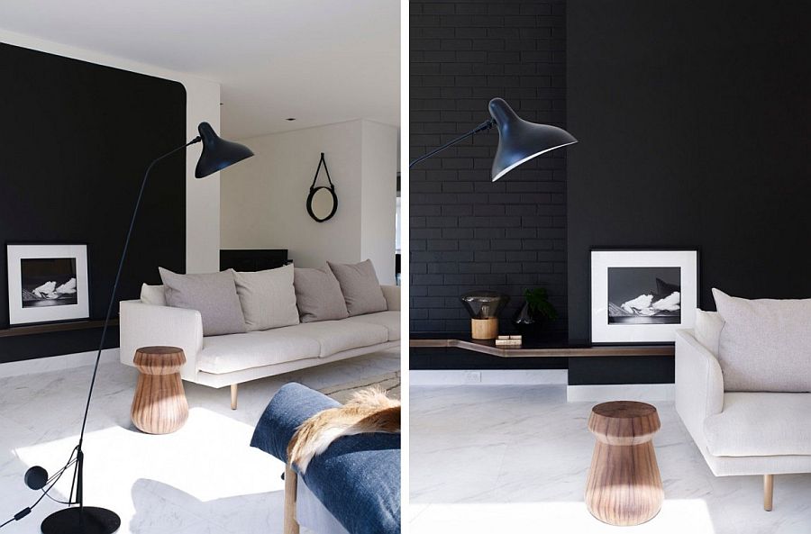 Black walls and floatings shelves coupled with decor in lighter hues