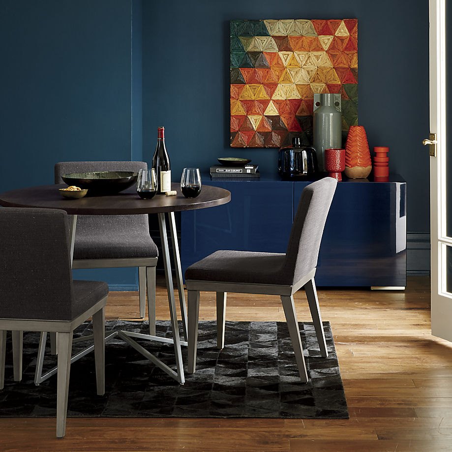 Blue and orange in a CB2 dining room