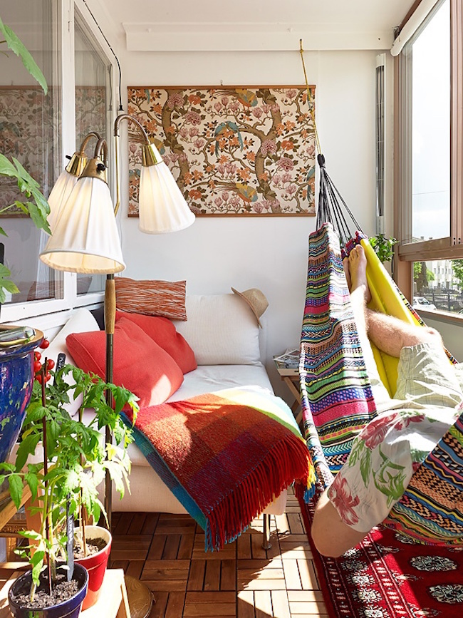 Bohemian-style sunroom with hammock