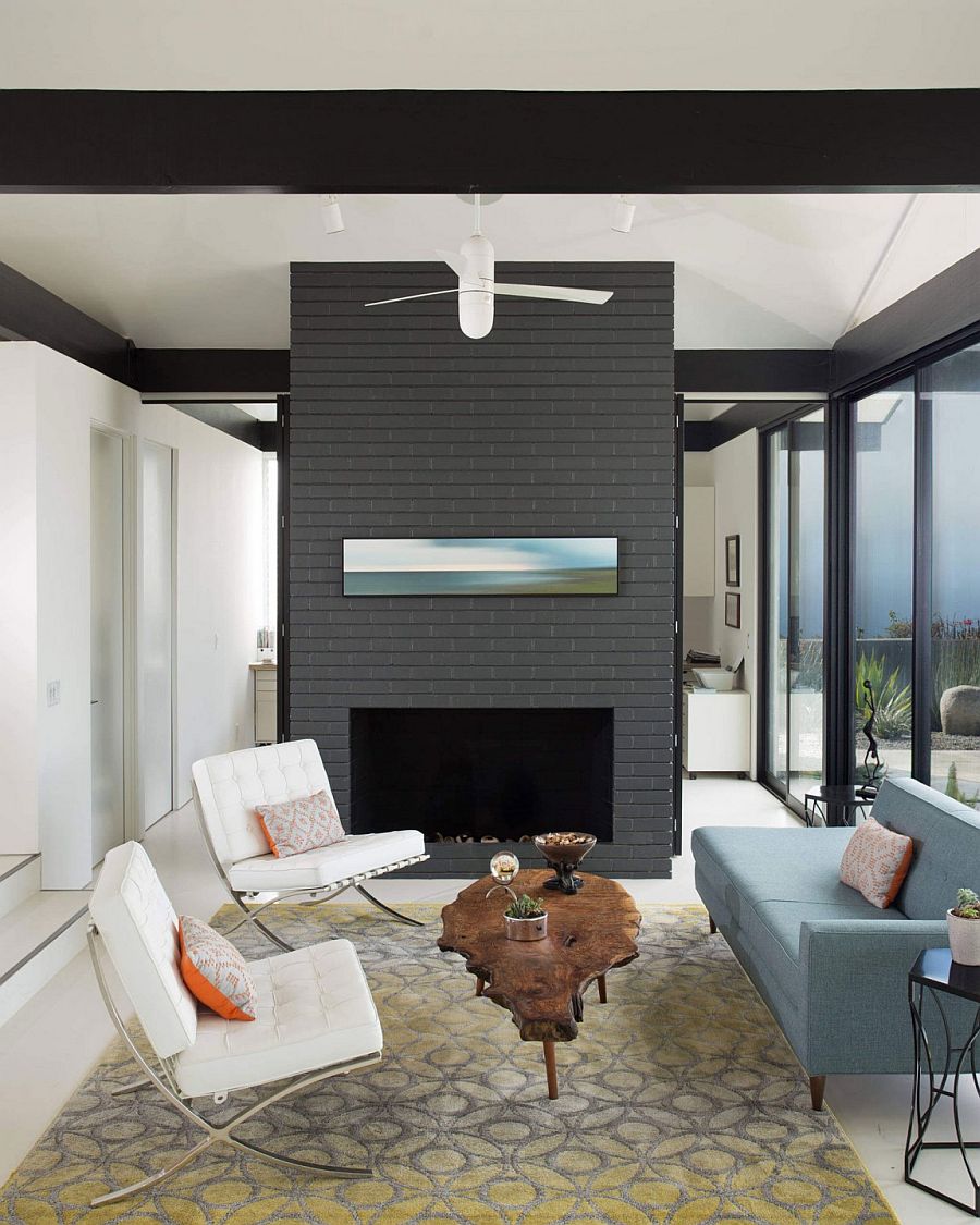 Breezy living room with gray fireplace wall