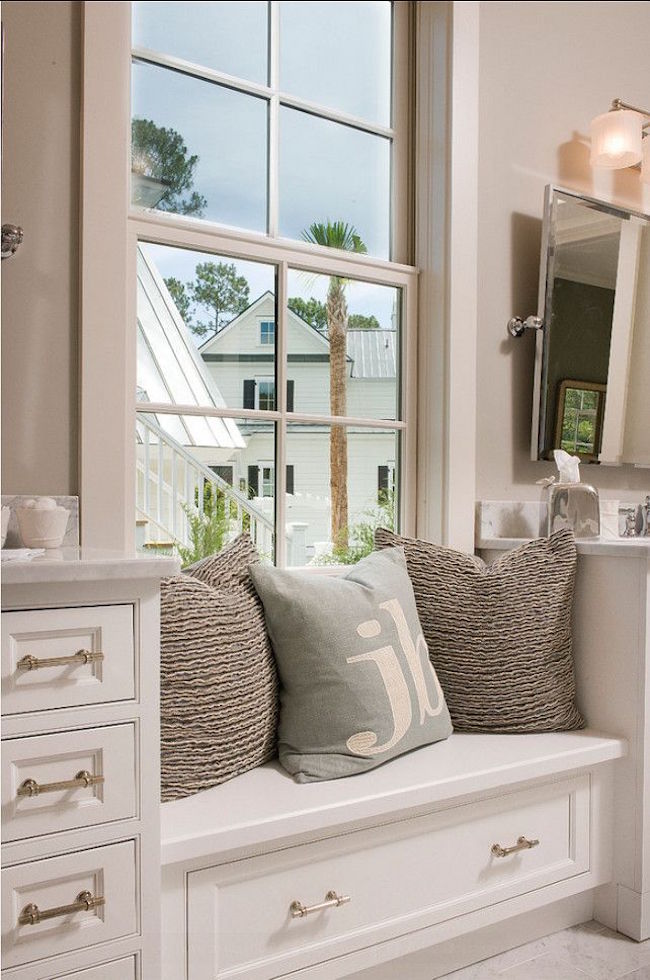 Built-in bathroom window seat with storage