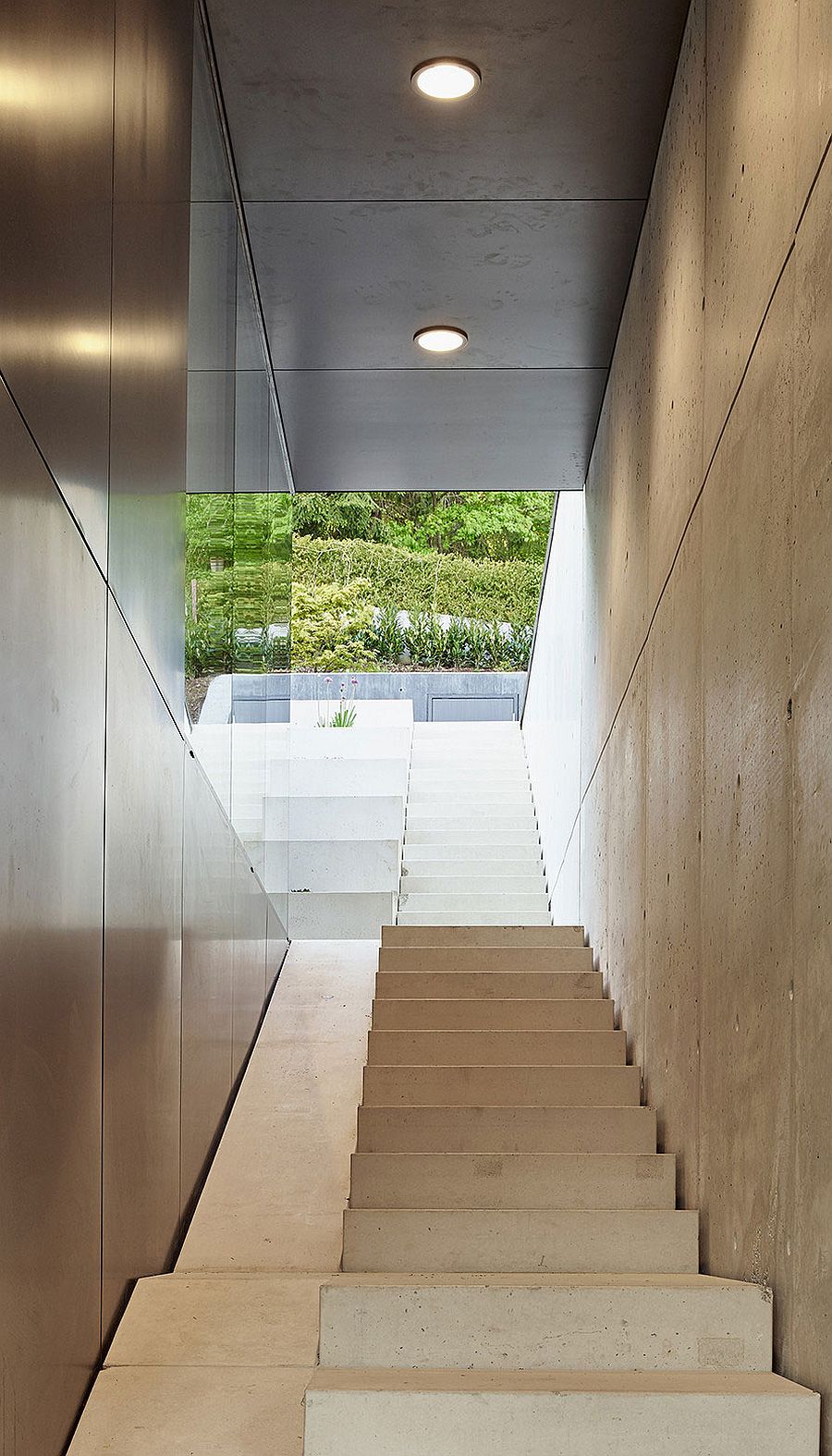 Central staircase the connects the various levels of the house with outdoors